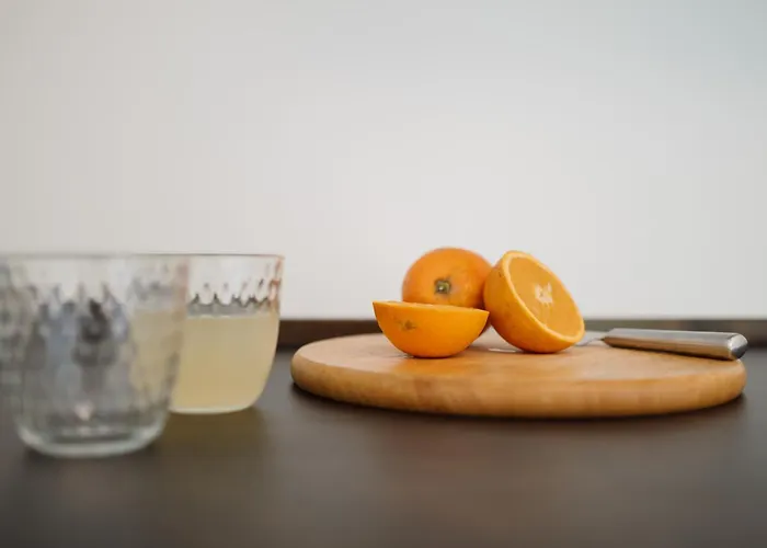 Guesthost - Modern Escape With Pool & Sunny Terrace Apartment *